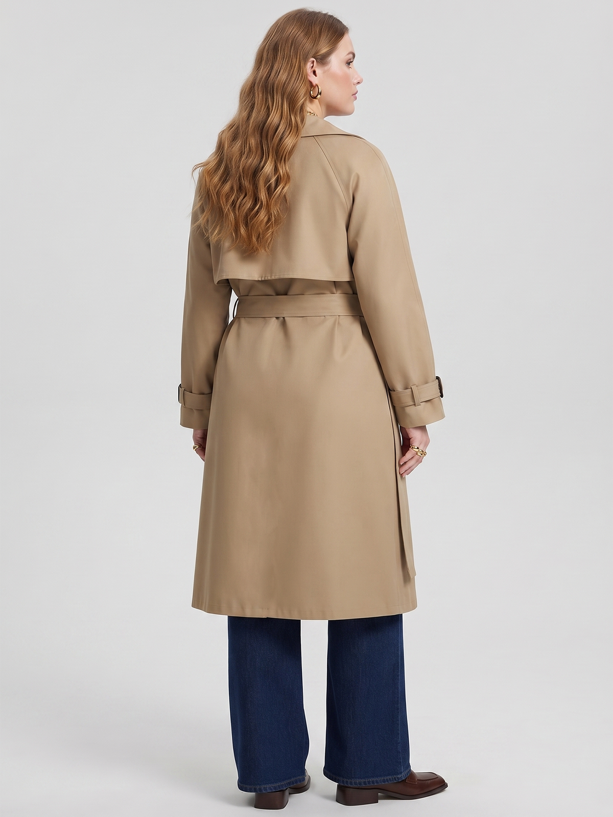 Belted midi trench coat in beige, back view.