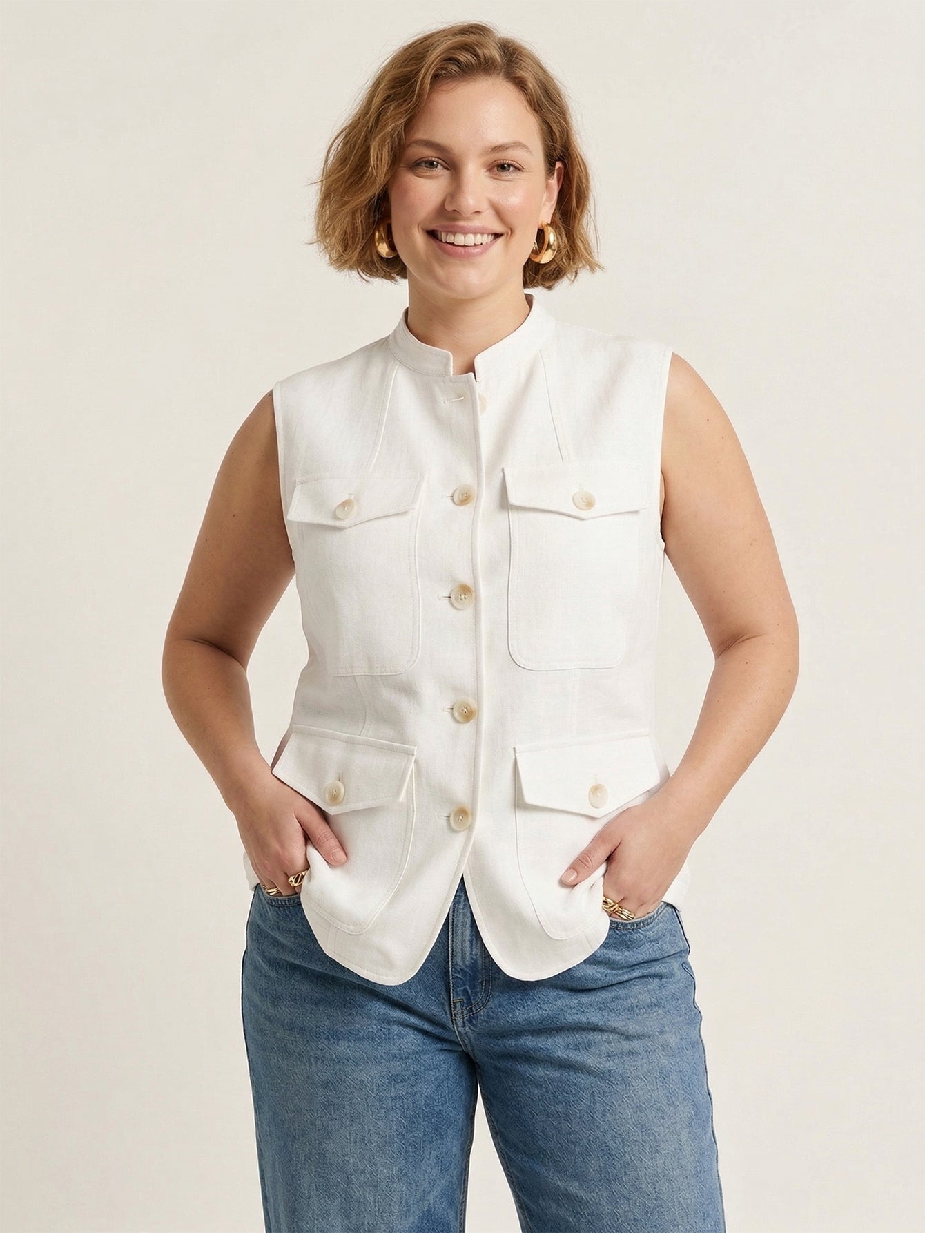 White linen-blend sleeveless vest with stand collar, front view.