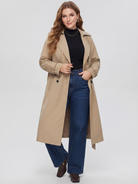 Belted midi trench coat in beige, three-quarter view.