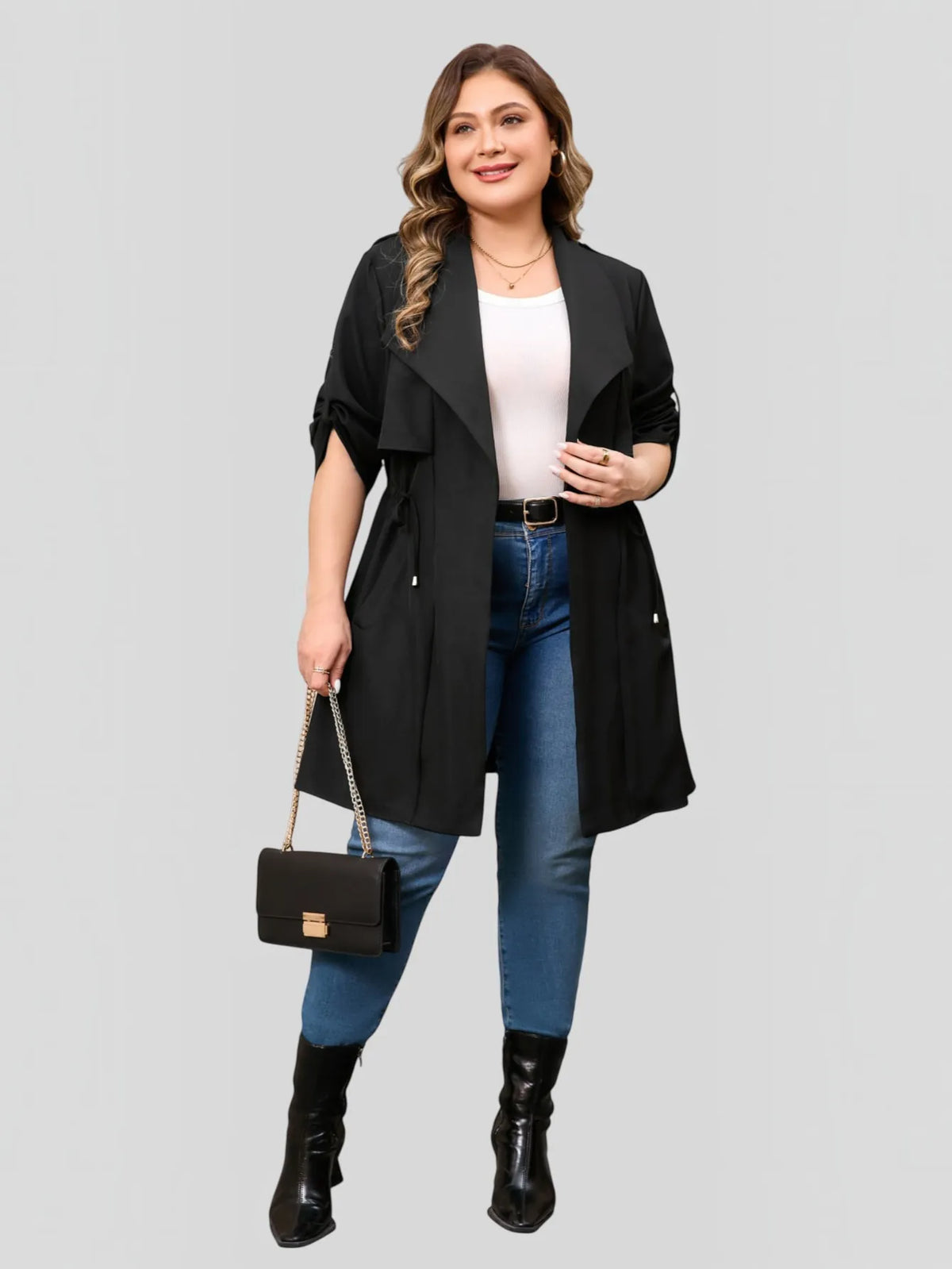 Drawstring-waist trench coat in black, front view.