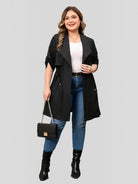 Drawstring-waist trench coat in black, front view.