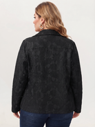 Lace-knit jacket with zip pockets in black, back view.