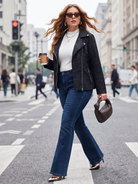 Lace-knit jacket with zip pockets in black, walking view with jeans.