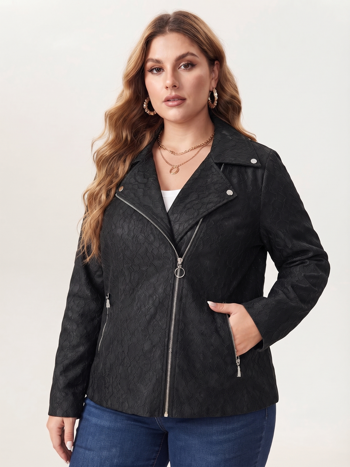 Lace-knit jacket with zip pockets in black, front view showing the zip closure.