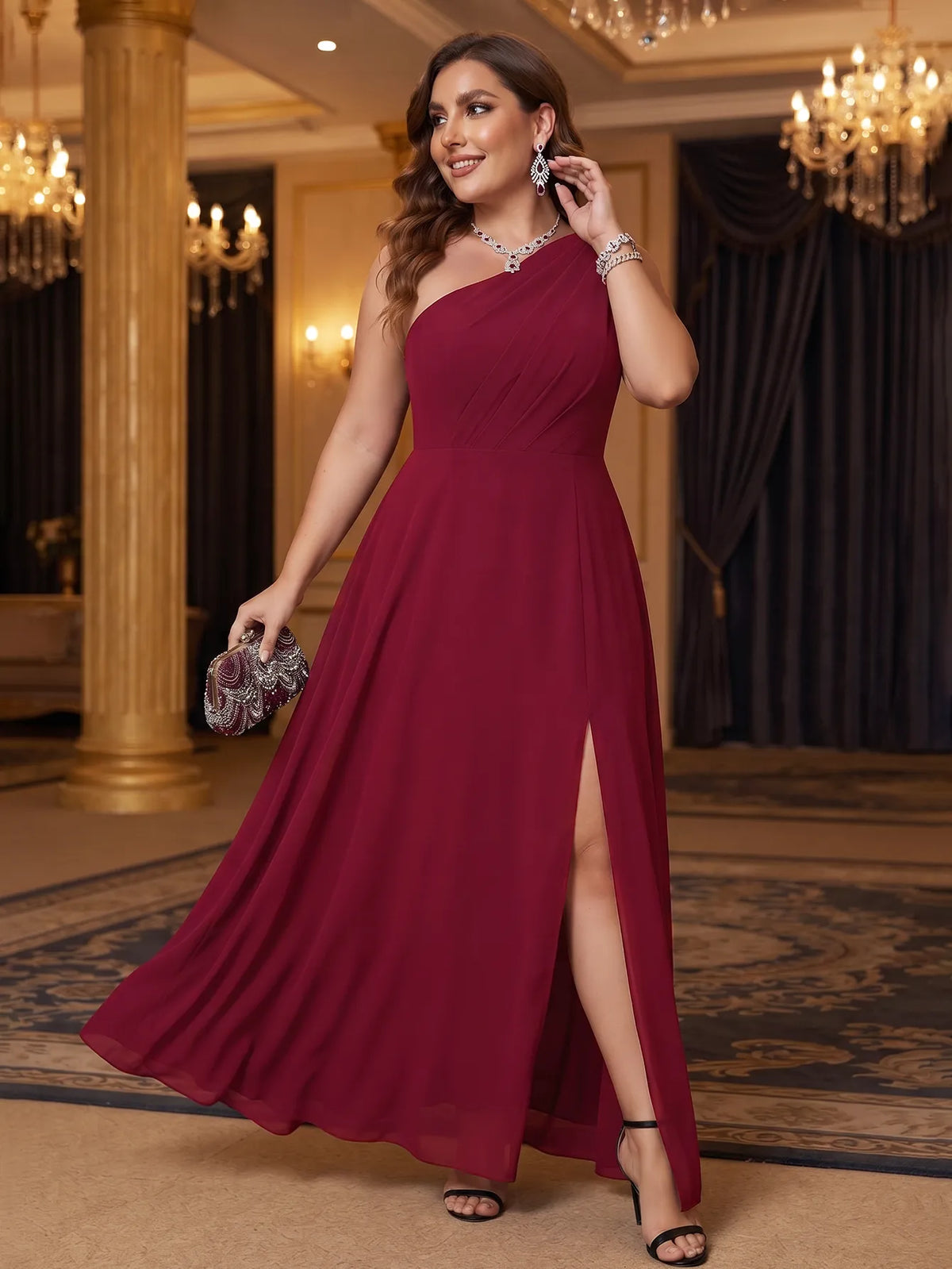 One-shoulder chiffon maxi dress in burgundy, evening outfit with a clutch.