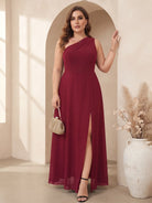 One-shoulder chiffon maxi dress in burgundy, outfit shown indoors.